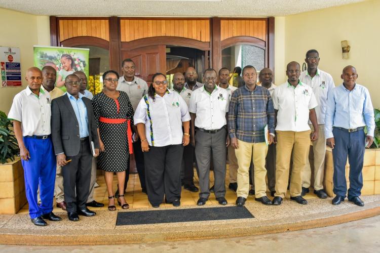 SonySugar Management and AFA team led by the Director General, Beatrice Nyamwamu, and SonySugar Managing Director Stephen Ligawa pose for a group photo outside SonySugar main boardroom during a visit on 17th December, 2022.
