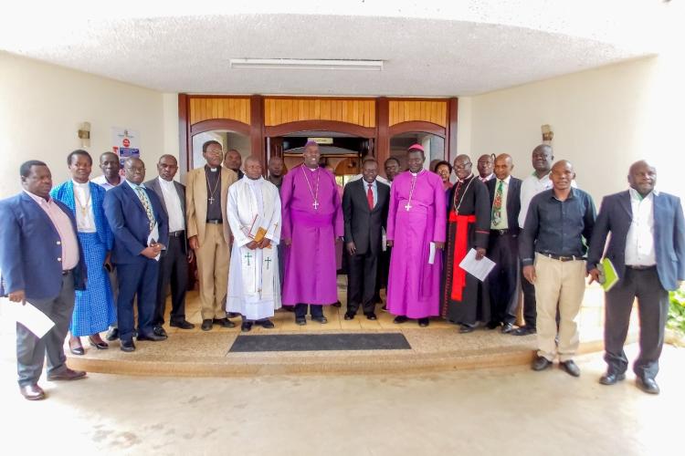 ACK Archbishop Dr. Jackson Ole Sapit pose for a photo with SonySugar Management during a visit to the Company of 9th December 2022.